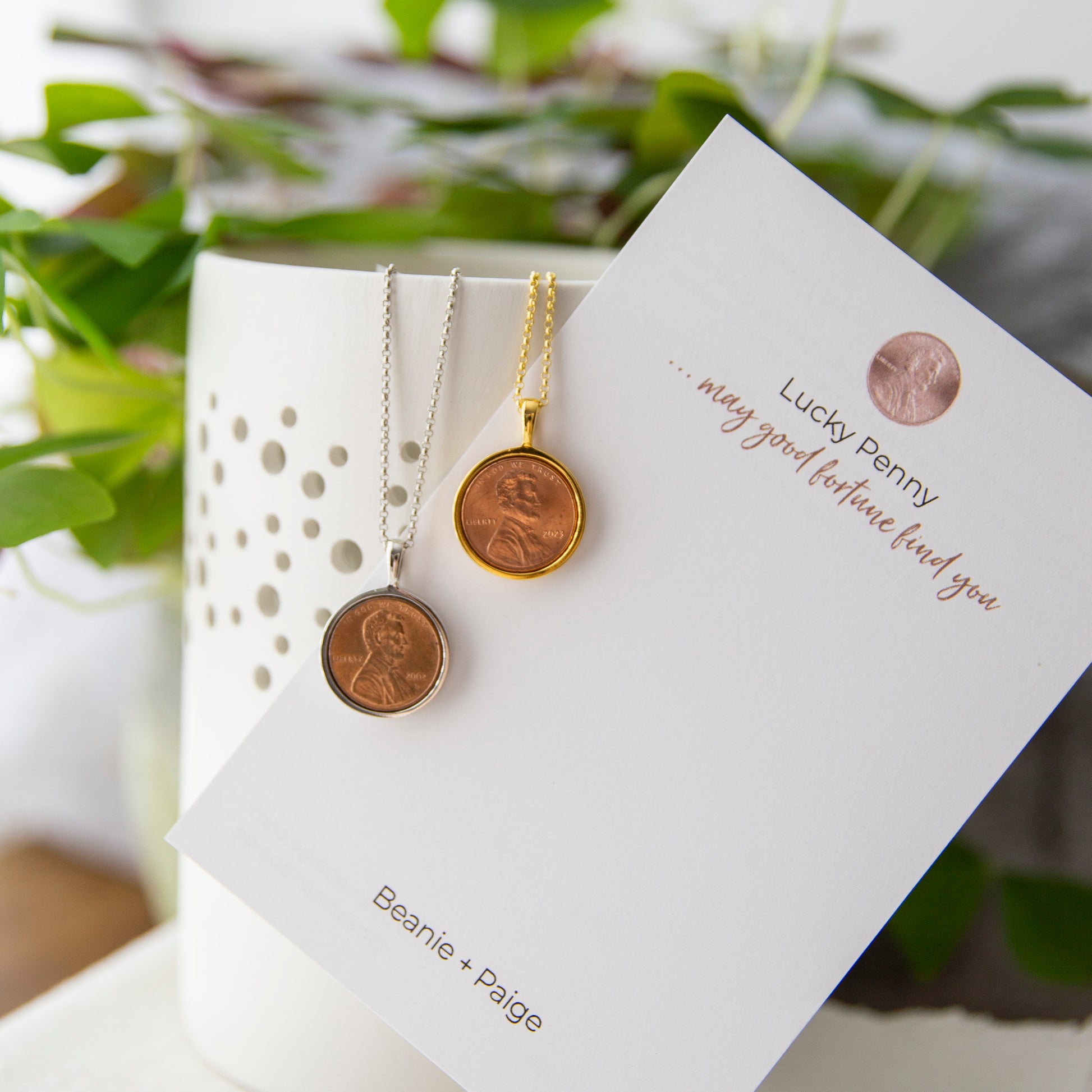 Lucky Penny Necklaces in both silver and gold on card
